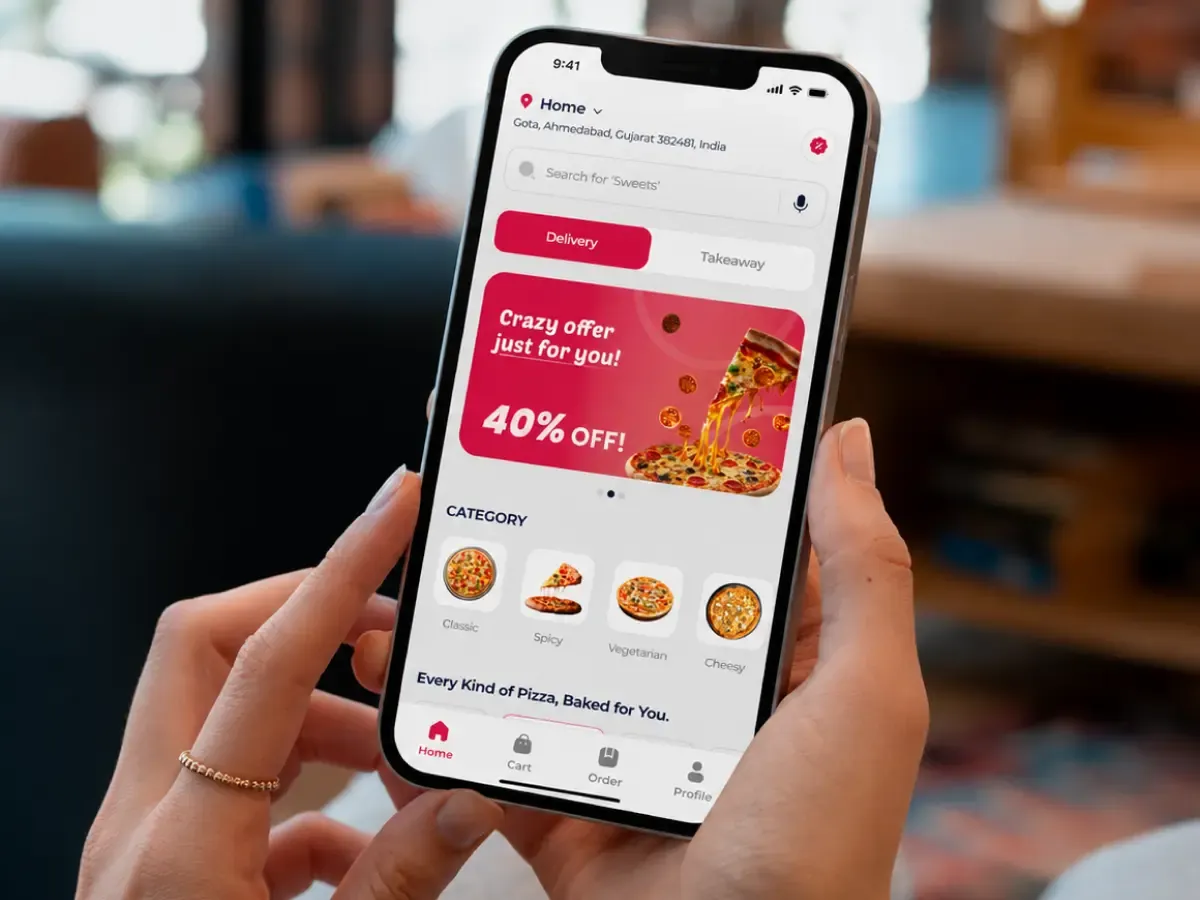Pizza ordering app in hand