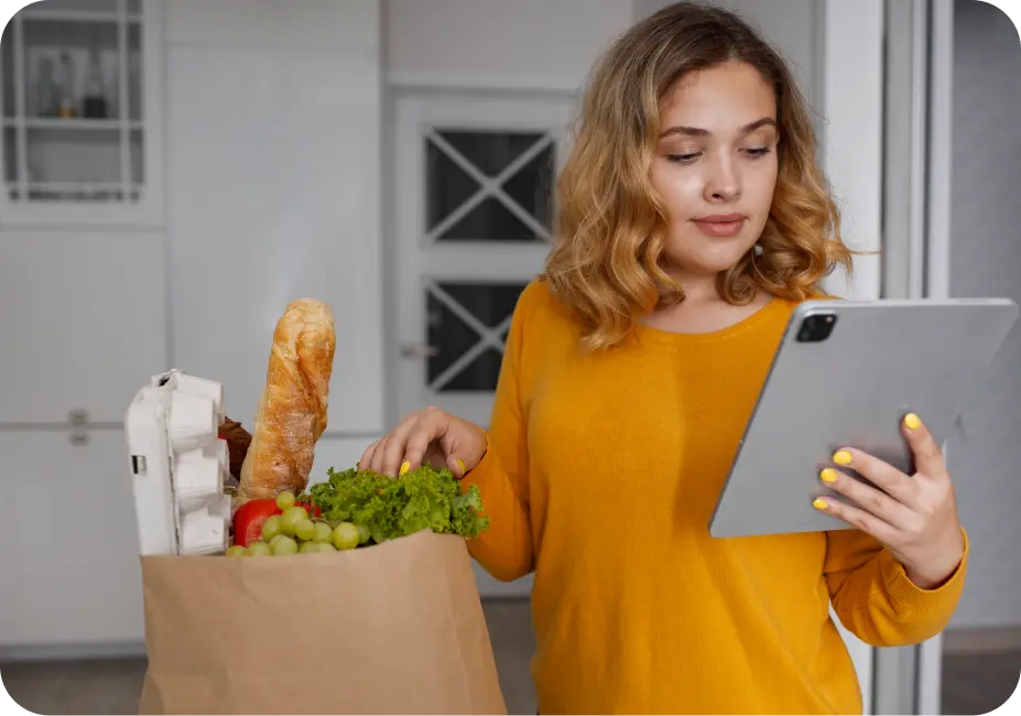 A user interacting with a car rental app on a mobile device, showing a map with available vehicles.