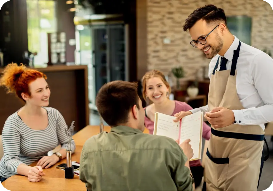 A mechanic using a workshop management software on a rugged tablet to manage repairs and inventory.