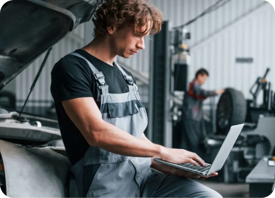 A user interacting with a car rental app on a mobile device, showing a map with available vehicles.