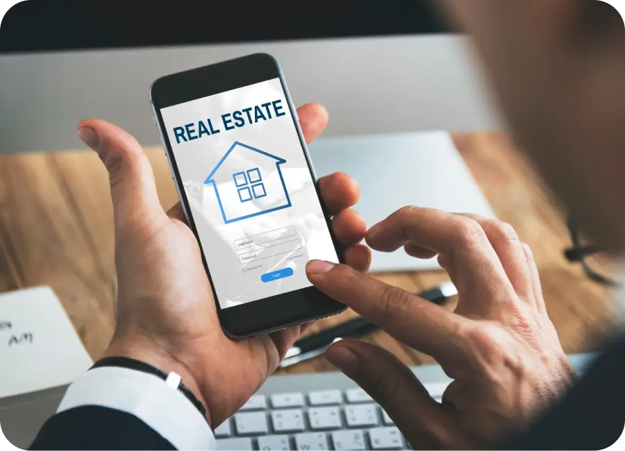 A user browsing a property listing platform on a laptop, showing houses with advanced search filters.