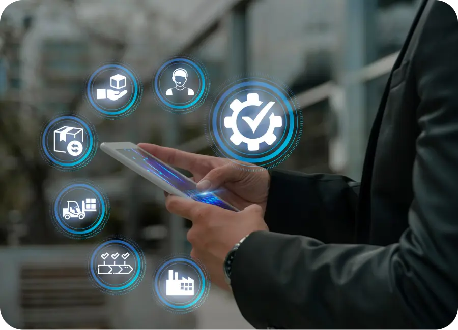 A warehouse employee using a handheld scanner to track inventory for a supply chain solution.